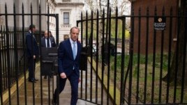 Britain's Foreign Secretary Dominic Raab arrives in Downing Street, London, Monday April 6, 2020.(Dominic Lipinski/PA via AP)