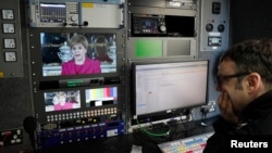 An engineer works in a television production truck as Scotland's First Minister Nicola Sturgeon demands a new independence referendum, once the terms of Britain's exit from the EU have become clearer, outside Bute House, in Edinburgh, March 13, 2017.