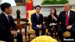U.S. President Donald Trump meets with North Korean defectors in the Oval Office of the White House in Washington, U.S. (February 2, 2018.) 