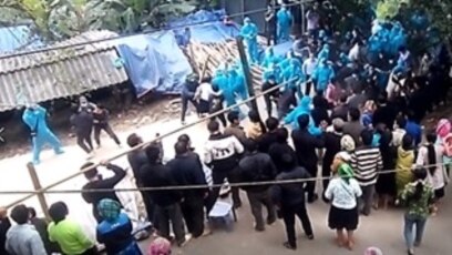 Chính quyền địa phương đến nhà ông Dương Văn Mình ở Tuyên Quang yêu cầu làm xét nghiệm COVID-19 và bắt bớ. Ảnh do tín đồ cung cấp.