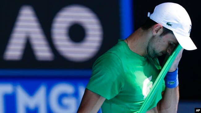 Defending men's champion Novak Djokovic of Serbia practices on Margaret Court Arena ahead of the Australian Open tennis championship in Melbourne, Australia, Jan. 13, 2022.