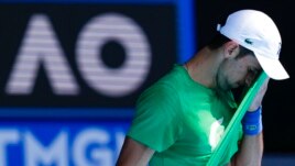 Defending men's champion Novak Djokovic of Serbia practices on Margaret Court Arena ahead of the Australian Open tennis championship in Melbourne, Australia, Jan. 13, 2022.