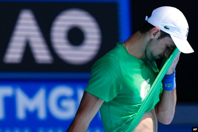 Defending men's champion Novak Djokovic of Serbia practices on Margaret Court Arena ahead of the Australian Open tennis championship in Melbourne, Australia, Jan. 13, 2022.