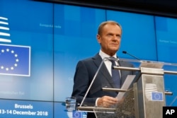 FILE - European Council President Donald Tusk speaks during a media conference at an EU summit in Brussels, Dec. 14, 2018.
