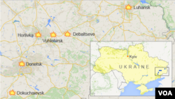 Map of Ukraine showing Donetsk, Luhansk, Debaltseve, Vuhlehirsk, Dokuchaievsk, and Horlivka