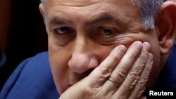 Prime Minister Benjamin Netanyahu sits at the plenum at the Knesset, Israel's parliament, in Jerusalem, May 30, 2019. 