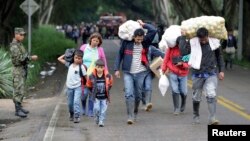 Miles de familias campesinas comienzan el retorno a sus parcelas, luego de 12 días de paro en Colombia. 