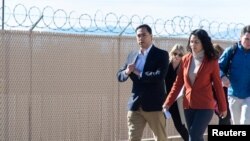 U.S. Representatives Xochitl Torres Small (D-NM) and Joaquin Castro (D-TX) exit after touring a Border Patrol substation with other legislators in Alamogordo, New Mexico, Jan. 7, 2019. 