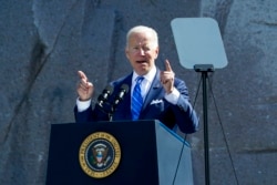 President Joe Biden speaks during an event marking the 10th anniversary of the dedication of the Martin Luther King, Jr. Memorial in Washington, Oct. 21, 2021.
