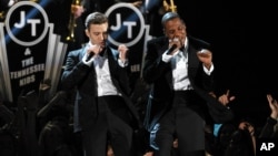 Justin Timberlake, left, and Jay-Z perform on stage at the 55th annual Grammy Awards on Feb. 10, 2013, in Los Angeles.