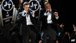 Justin Timberlake, left, and Jay-Z perform on stage at the 55th annual Grammy Awards on Feb. 10, 2013, in Los Angeles.