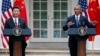 President Barack Obama gestures during a joint news conference with Chinese President Xi Jinping, in the Rose Garden of the White House in Washington, Sept. 25, 2015.