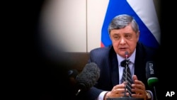FILE - Russian President Vladimir Putin's special envoy for Afghanistan Zamir Kabulov speaks during a press conference in Brussels, Belgium, Oct. 26, 2017.