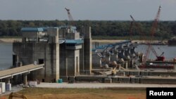 FILE - Construction of the new Olmsted Locks and Dam continues on the Ohio River in Olmsted, Illinois, Sept. 19, 2017.