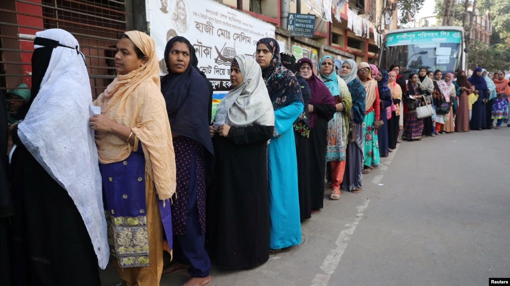 Women stand in a line at a voting center to cast their ballot during the general election in Dhaka, Bangladesh, Dec. 30, 2018.