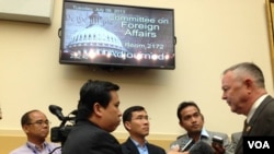 VOA Khmer reporters Men Kimseng, Poch Reasey, and Sok Khemara interviewing US Congressman Dana Rohrabacher of California during House hearing on ‪#‎Cambodia‬ on July 9, 2013. (VOA Khmer/Sophat Soeung)