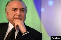 FILE - President of Brazil, Michel Temer, speaks with Reuters Editor-in-Chief Steve Adler about the future of Latin America’s largest economy as it emerges from recession and a large-scale corruption scandal in New York, Sept. 20, 2017.
