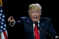 FILE - Republican presidential candidate Donald Trump speaks during the opening session of the Western Conservative Summit in Denver, July 1, 2016.