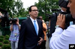 Treasury Secretary Steven Mnuchin speaks with reporters at the White House in Washington, June 27, 2018.