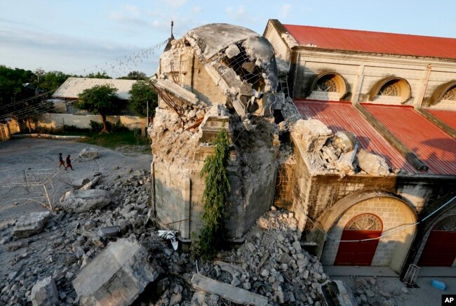The damage of St. Catherine church following a 6.1 magnitude earthquake that also caused the collapse of a commercial building, is seen in Porac township, Pampanga province, north of Manila, Philippines, April 23, 2019.