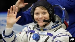 U.S. astronaut Anne McClain, a member of the main crew of the expedition to the International Space Station, before the launch of Soyuz MS-11 space ship at the Russian leased Baikonur cosmodrome, Kazakhstan, Dec. 3, 2018.