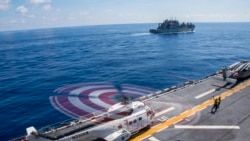 好人理查號兩棲攻擊艦載有一架直升機在南中國海行動（美國海軍2016年10月3日）