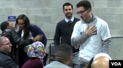 Abdullah Hammoud, (in white) an Arab-American Muslim, greets supporters after winning a seat in the Michigan House of Representatives, November 8, 2016.