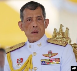 FILE - Thailand's Crown Prince Vajiralongkorn is seated at the royal plowing ceremony in Bangkok.