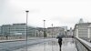 Walking across London Bridge on a rainy, wet day in June 2011 