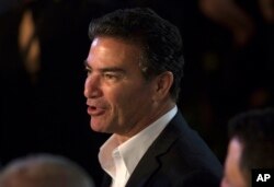 In this July 3, 2017 photo, Yossi Cohen, the head of the Israeli Mossad attends U.S. Independence Day celebrations at the residence of Ambassador to Israel, David Friedman.