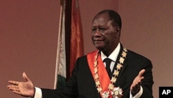 Alassane Ouattara gestures during his inauguration ceremony, in Yamoussoukro, Ivory Coast, May 21, 2011.