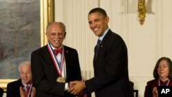 Warren Washington receives the National Medal of Science from President Barack Obama in 2010.