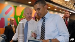 President Barack Obama and Vice President Joe Biden order lunch at a sandwich shop near the White House, Oct. 4, 2013.