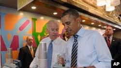 President Barack Obama and Vice President Joe Biden order lunch at Taylor Gourmet sandwich shop near the White House in Washington, Oct. 4, 2013.