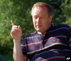 FILE - Suspended prosecutor general Yuri Skuratov speaks during an interview at his country home outside Moscow, Sept. 3, 1999.