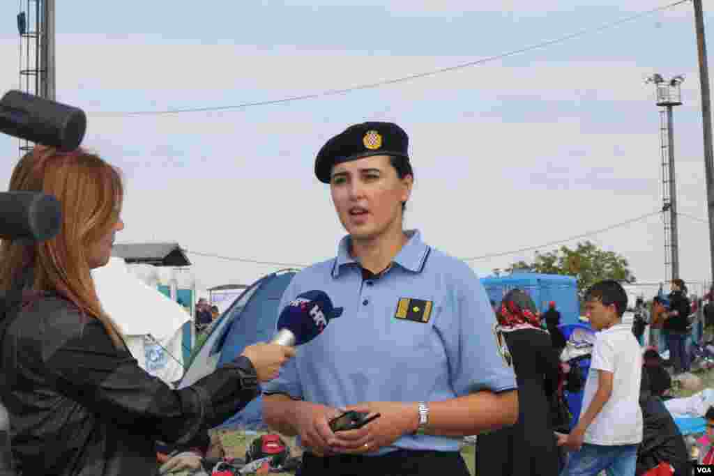 Information for refugees is scarce, and mostly based upon rumors. Croatian police speak to journalists, but there are almost no people around who can translate from Croatian into any of the many languages spoken outside the camp, Opatovac, Croatia, Sept. 22, 2015.