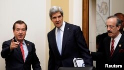 U.S. Secretary of State John Kerry (C) is escorted by Rep. Ed Royce (L), chairman of the House Foreign Affairs Committee, and Rep. Eliot Engel (R) before giving testimony on Capitol Hill in Washington, April 17, 2013.