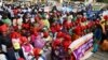 Les partisans des partis d'opposition participent à un rassemblement contre la politique du président sortant à Dakar, le 11 janvier 2019.