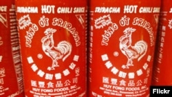 Sriracha is a hot sauce or chili sauce made from chili peppers, distilled vinegar, garlic, sugar and salt. (Photo by Flickr user Mike Mozart via Creative Commons license)