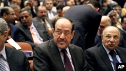 PM Irak Nouri al-Maliki menghadiri sidang parlemen Irak di Baghdad (1/7). 