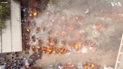 Bodies Burned in Mass Cremation in India Amid COVID-19 Death Spike 
