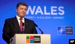 Ukrainian President Petro Poroshenko speaks during a media conference during a NATO summit at the Celtic Manor Resort in Newport, Wales, Sept. 4, 2014.