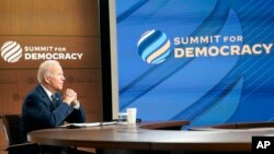 President Joe Biden speaks from the South Court Auditorium on the White House, Dec. 9, 2021, for the opening of the Democracy Summit.