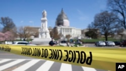 The north front of the U.S. Capitol in Washington is locked down after a shooting, April 11, 2015.