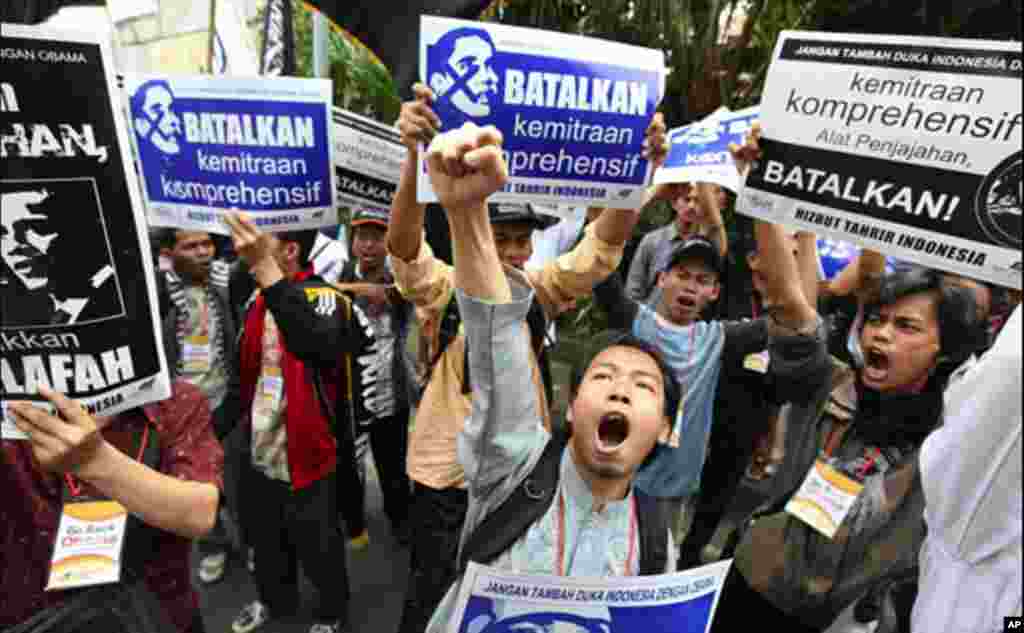 Protesters rally against President Obama's visit to Indonesia in Jakarta. The rally was organized by the Hizbut Tahrir Muslim organization that believes the U.S. oppresses the Muslim community. Indonesia is the world's largest Muslim-majority nation. (AFP