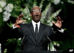 Dr. Kevin Cosby, senior pastor at St. Stephen Church, speaks during Muhammad Ali's memorial service in Louisville, Ky., June 10, 2016.