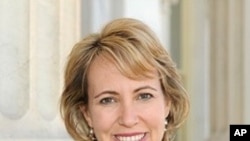 Rep. Gabrielle Giffords, Giffords poses for a photo (Mar 2010 file photo)
