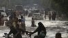 Pakistani PM Makes Plea for Rain-Battered Country