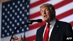 Republican presidential nominee Donald Trump speaks during a campaign rally at the NH Sportsplex in Bedford, New Hampshire, Sept. 29, 2016. 