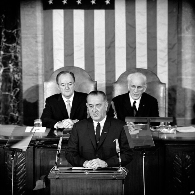 In this March 15, 1965 file photo, U.S. President Lyndon B. Johnson addresses a joint session of Congress in Washington where he urged the passing of the Voting Rights Act.